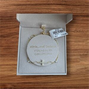 BRAND NEW Olivia & Jackson Cross gold toned and sparkly bracelet - Box included!